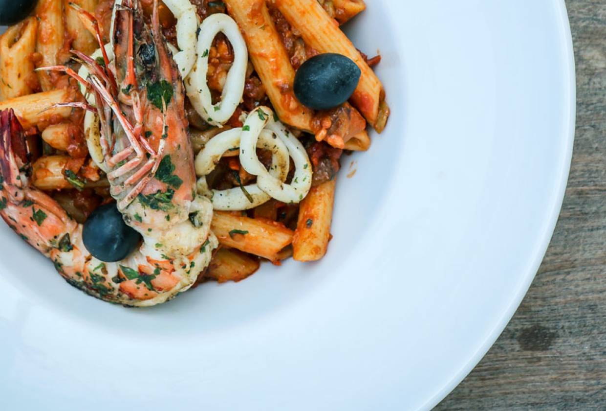 Seafood in red sauce pasta